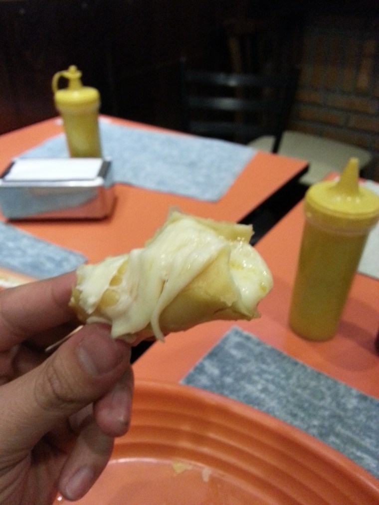Pastéis, a fried pastry stuffed with cheese and garlic.